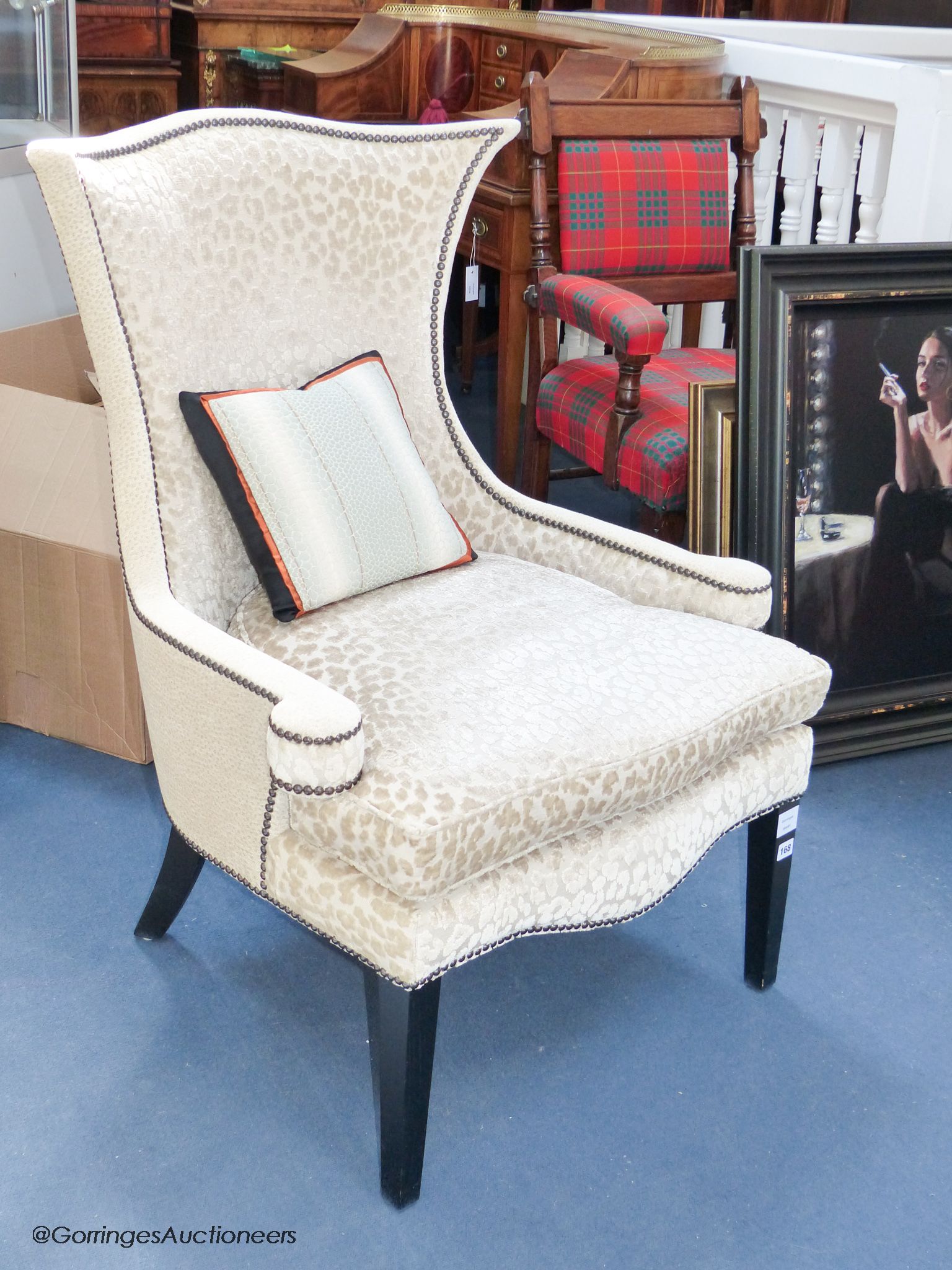 A contemporary upholstered armchair